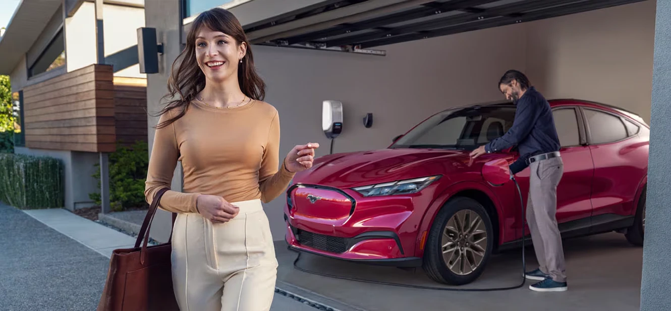 Man charging Ford Mustang Mach-E at home