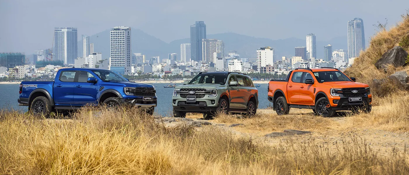 Ford cars infront of buildings