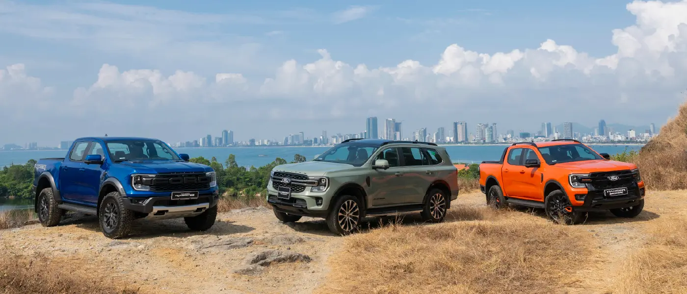 Ford vehicles on a hilltop