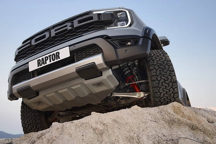 car in muddy on model new raptor