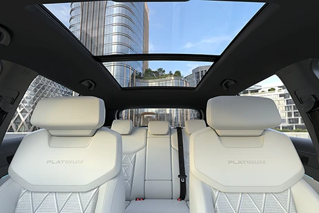 interior front view of beige car seat with rooftop
