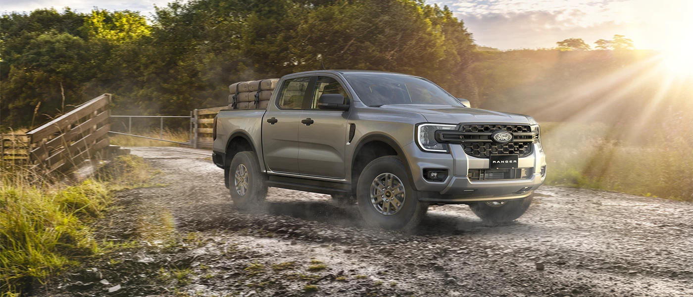 Xls 2L DoubleCab 4x4 Rural Driveway With Sunrise